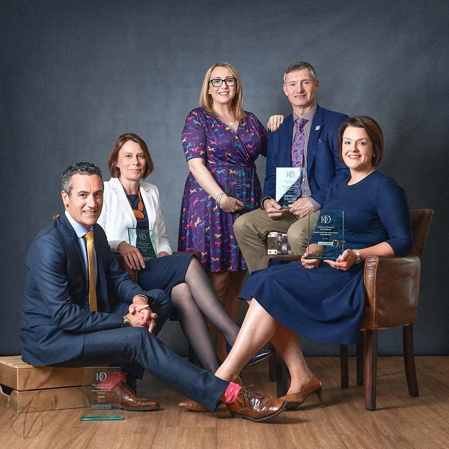 Group portrait of award winners holding trophies at Directors Awards