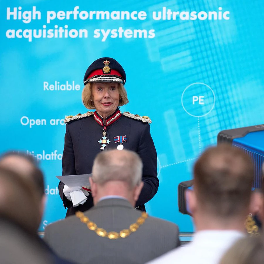Lord-Lieutenant delivering a keynote speech at a corporate event