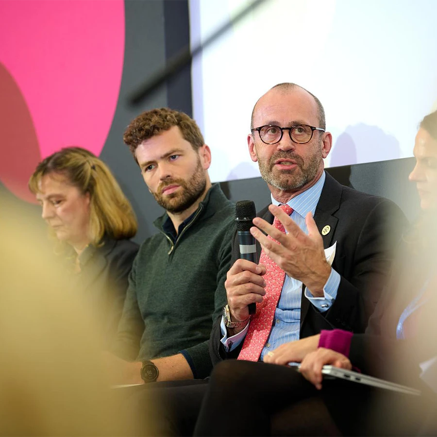 Panel discussion with business leaders during a corporate event